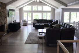 A Living Room With Ceiling Fan"