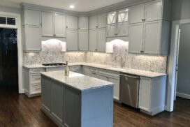 A Kitchen With A Light Gray Paint"